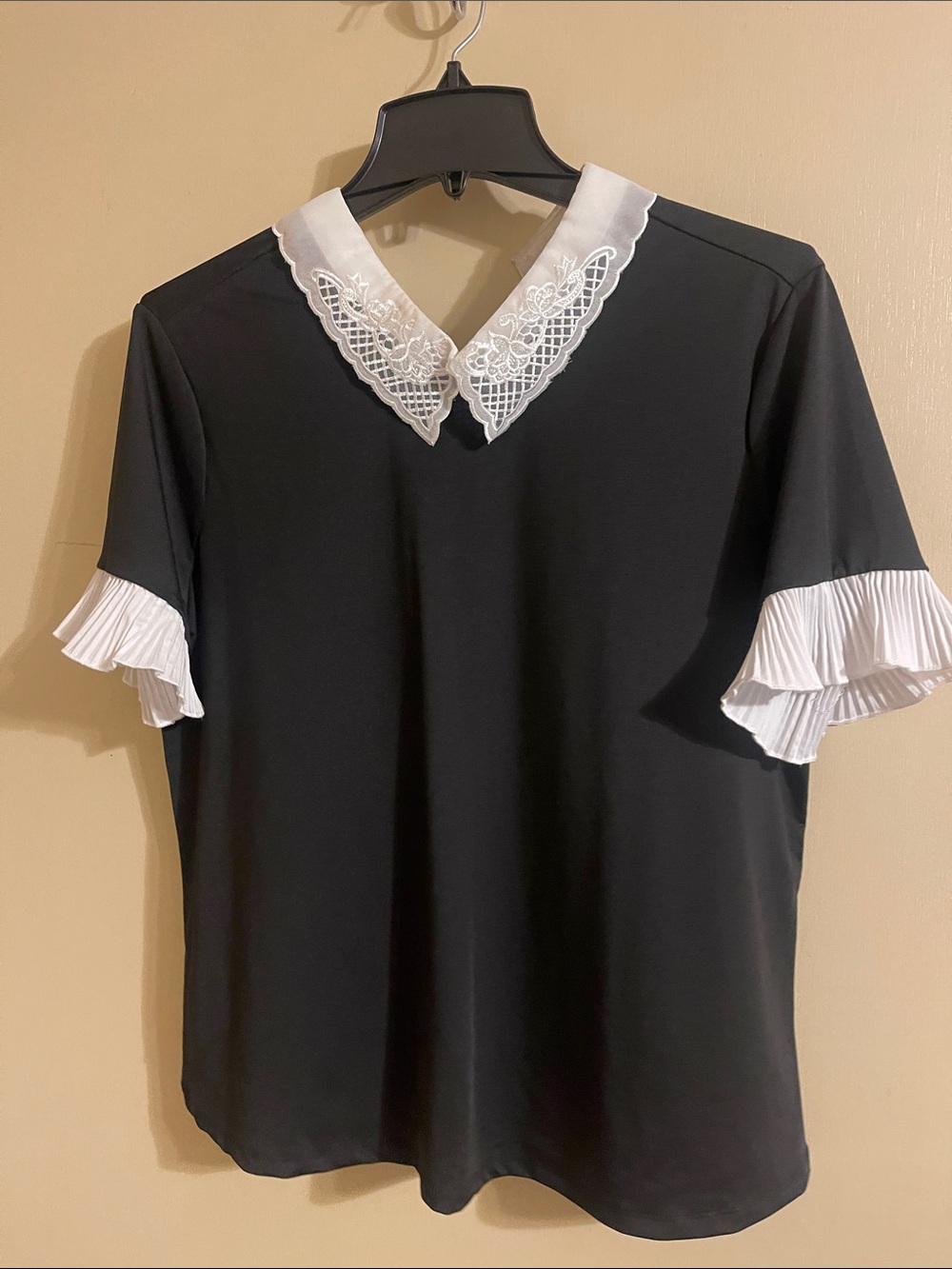 Black Blouse with White Lace Collar and Pleated Sleeve Accents